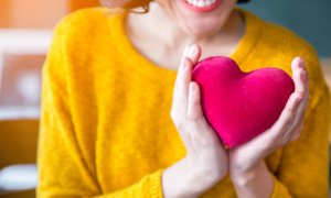 Woman holding a heart