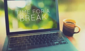 Laptop with a mug