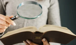 Person Holding a Bible